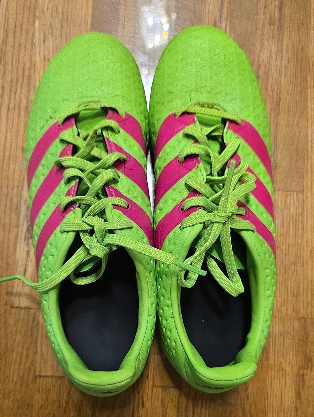 Bright Green and Pink Athletic Cleats